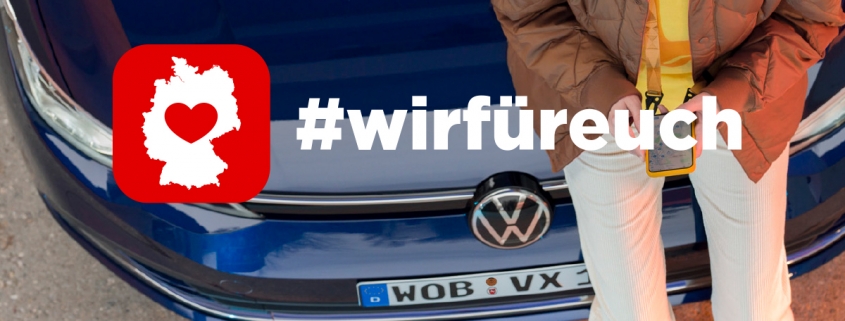 Das Bild zeigt eine Frau, die auf einem Auto sitzt und das Logo Wir Für Euch CoVid 19