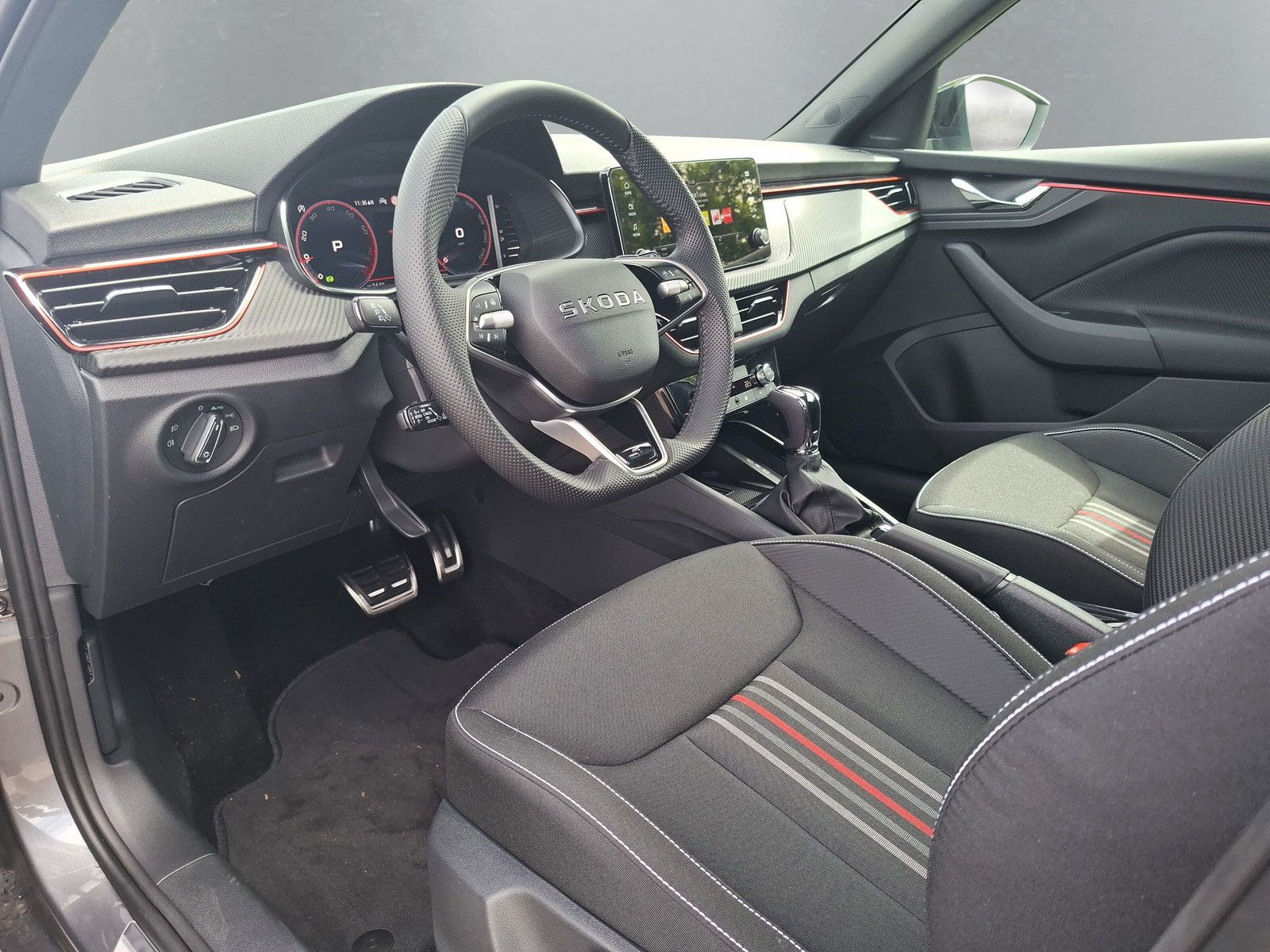 Fahrzeugabbildung SKODA Kamiq 1.5TSI Monte Carlo 18"eHeck AHK ACC Side