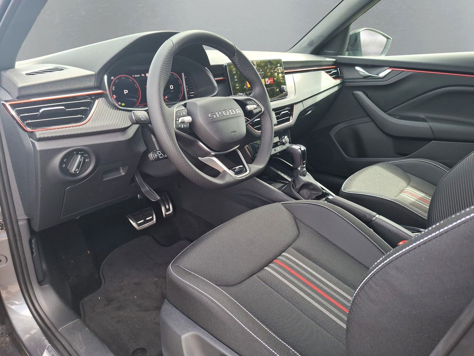 Fahrzeugabbildung SKODA Kamiq 1.5TSI Monte Carlo 18"eHeck AHK ACC Side